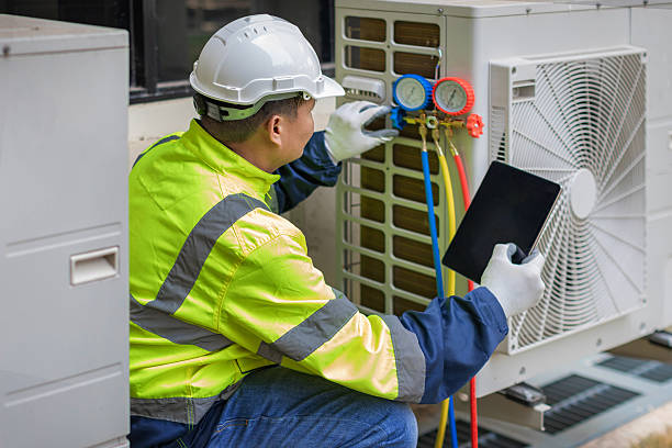 Professional Heat Pump Repair technician working in Canyon Lake, CA